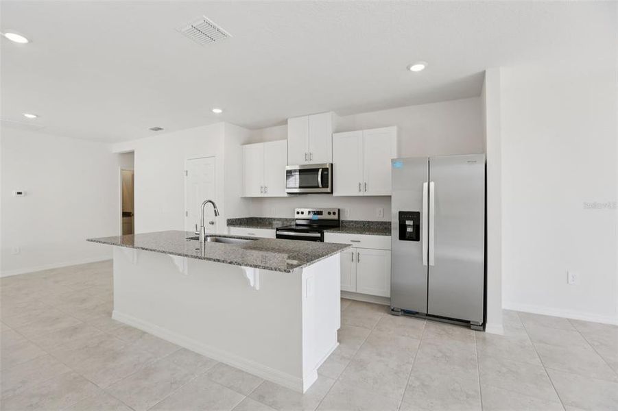 Furnished interior view inside a new home in Springs at Lake Alfred - Classic Series, Lake Alfred (Image 13).