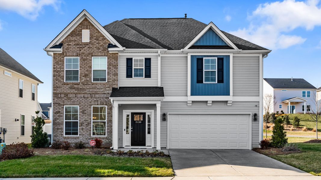 Front exterior of a new home in Hanes Lake, Winston-Salem, NC, highlighting curb appeal (Image 20).