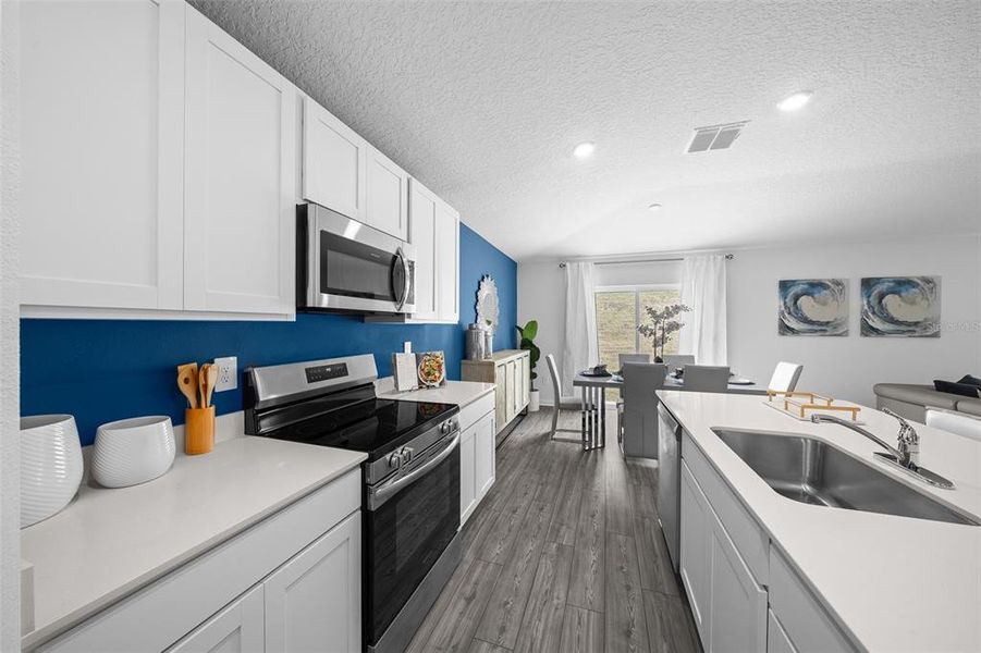 Furnished interior view inside a new home in Tara Forest East, Alachua (Image 34).