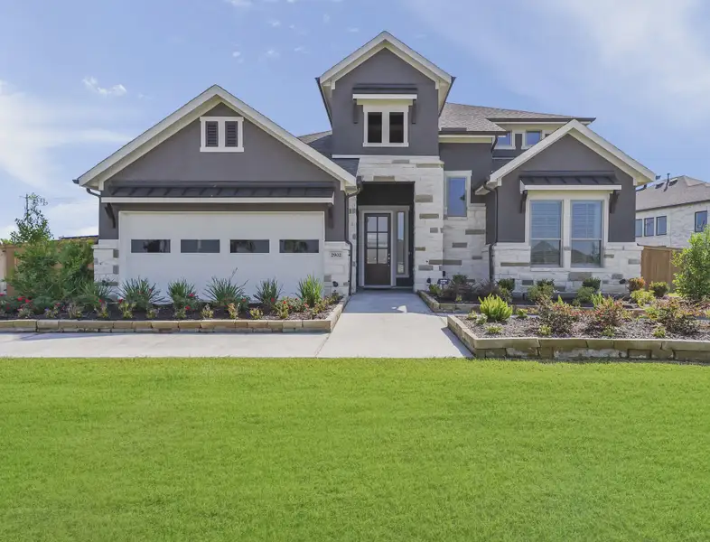 Representative exterior photo of a completed home built from the Gianna by Chesmar Homes in Jordan Ranch 55's, Fulshear, TX (Image 1). Representative exterior photo of a completed home built from the Gianna by Chesmar Homes in Jordan Ranch 55's, Fulshear, TX (Image 1).