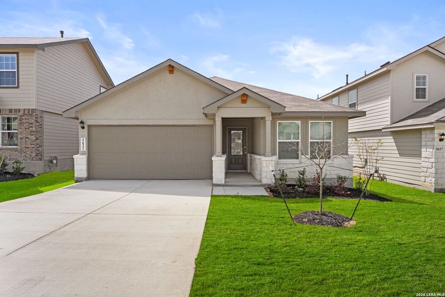Front exterior of a new home in Stonehill, San Antonio, TX, highlighting curb appeal (Image 1). Front exterior of a new home in Stonehill, San Antonio, TX, highlighting curb appeal (Image 1).