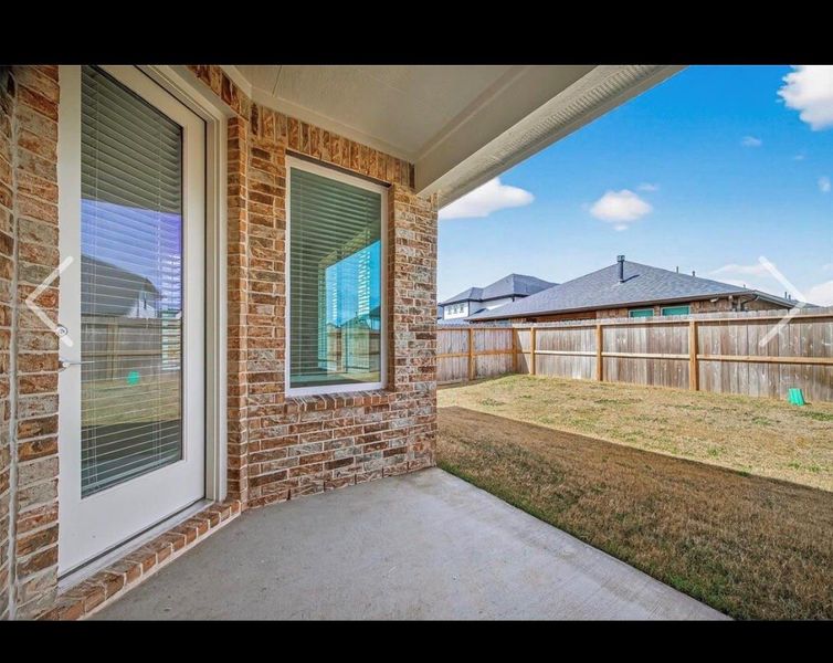 Exterior details and patio area of a home in Harvest Green, Richmond (Image 23).