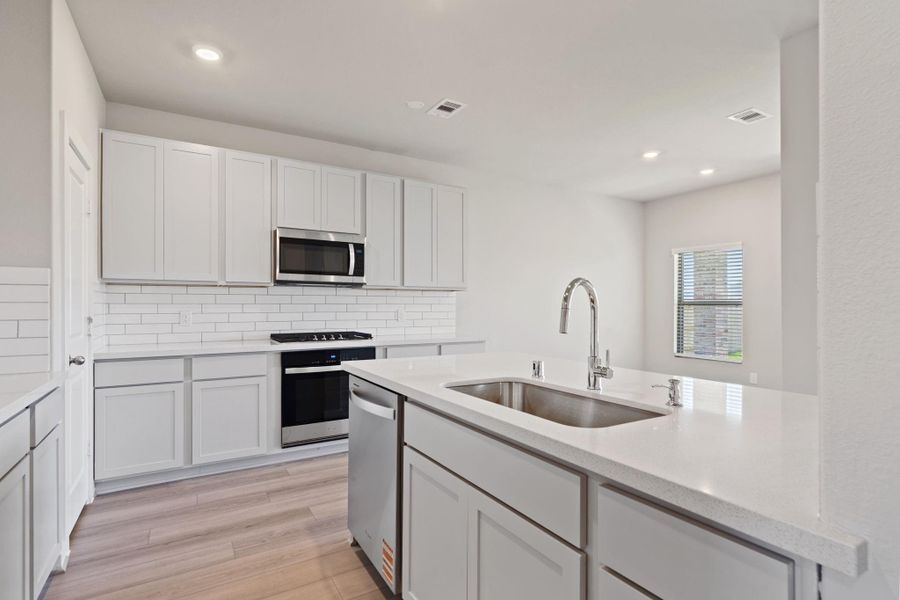 Furnished interior view inside a new home in , New Caney (Image 7).