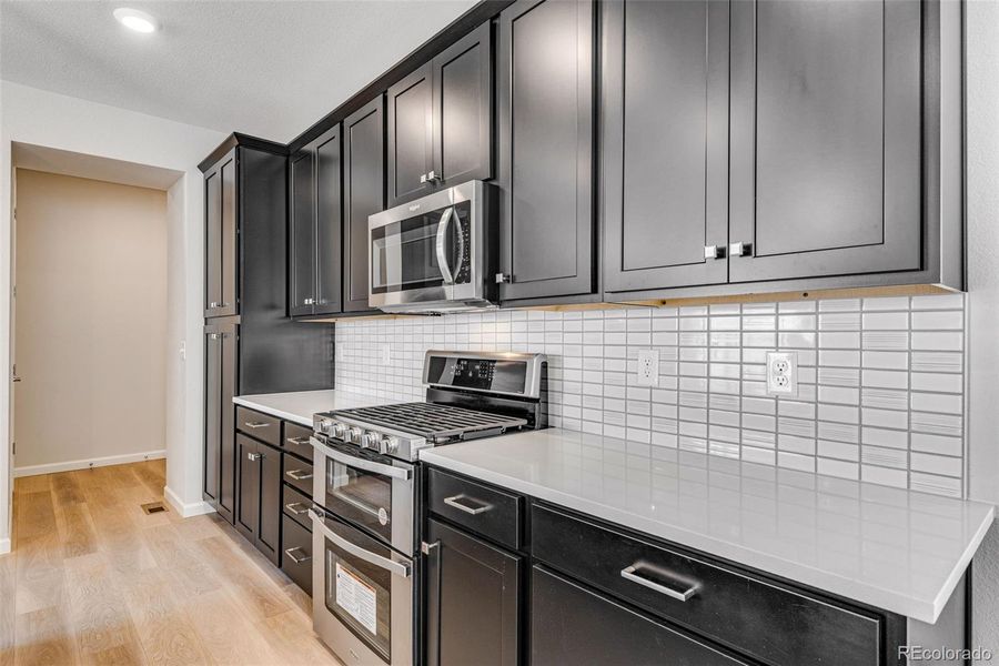 Furnished interior view inside a new home in Crescendo at The Aurora Highlands, Aurora (Image 6).