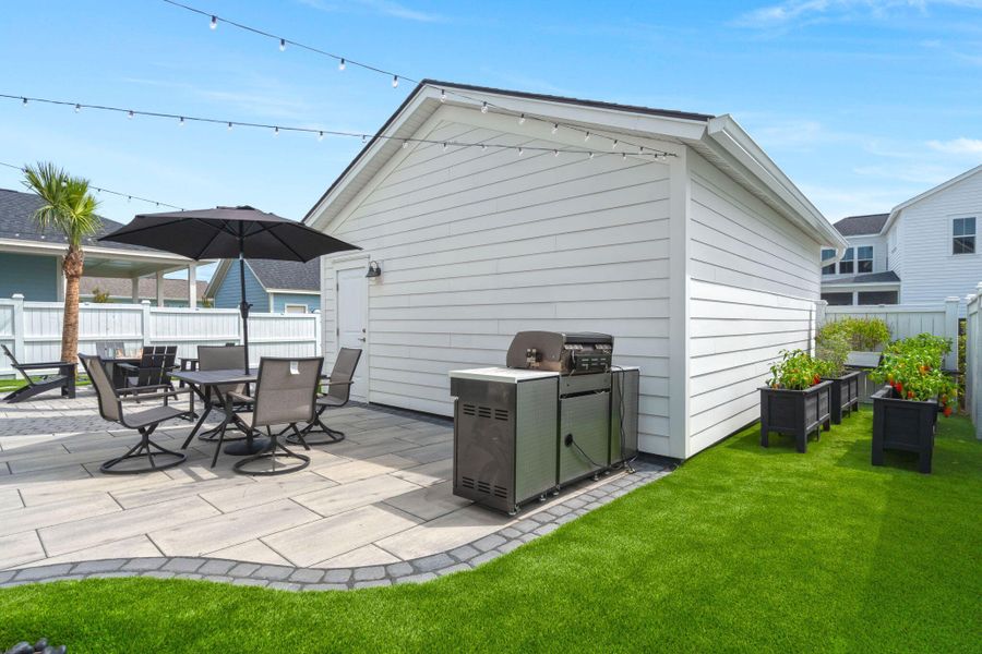 Front exterior of a new home in Nexton, Summerville, SC, highlighting curb appeal (Image 28). Front exterior of a new home in Nexton, Summerville, SC, highlighting curb appeal (Image 28).