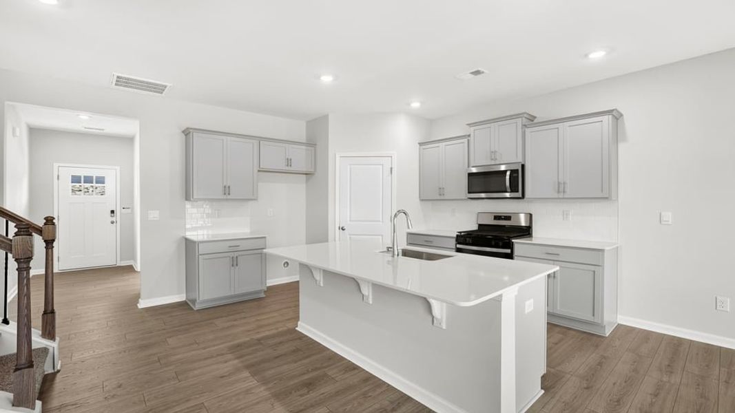 Furnished interior view inside a new home in Durbin Meadows Traditions, Fountain Inn (Image 8).