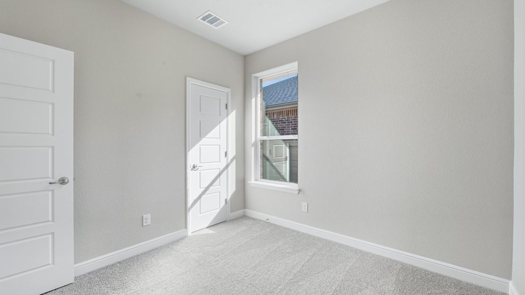 Representative unfurnished interior of a home built from the BASSWOOD by D.R. Horton in Treeline, Justin (Image 28).
