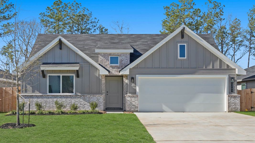 Front exterior of a new home in Silverthorne, Conroe, TX, highlighting curb appeal (Image 1). Front exterior of a new home in Silverthorne, Conroe, TX, highlighting curb appeal (Image 1).