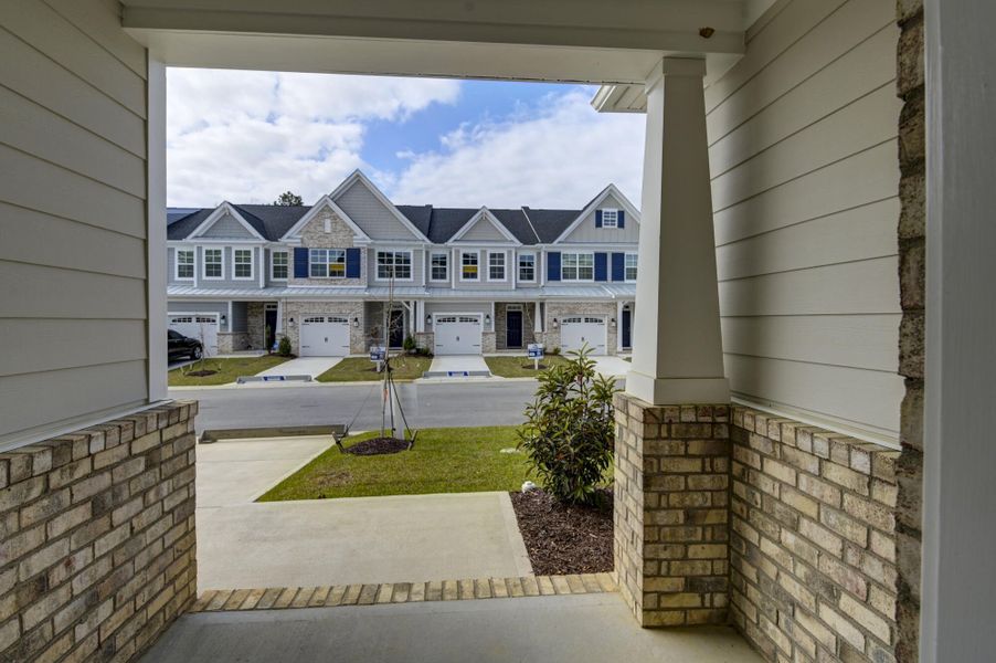 Exterior details and patio area of a home in Lake Carolina Townhomes, Columbia (Image 4).