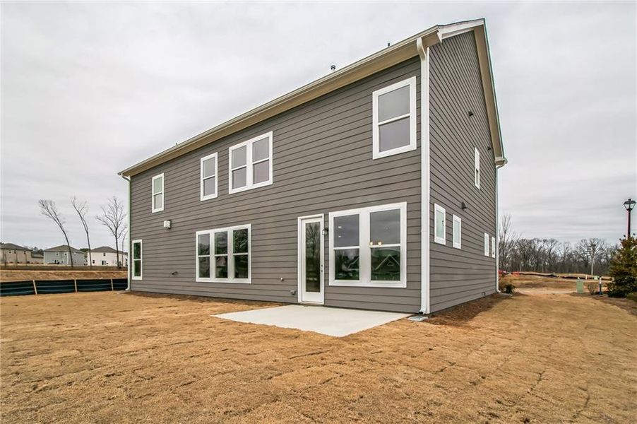 Exterior details and patio area of a home in Maddox Landing, Hoschton (Image 15).