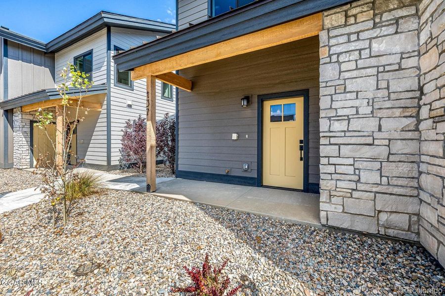 Front exterior of a new home in , Granby, CO, highlighting curb appeal (Image 1).