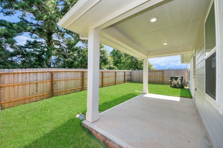 Exterior details and patio area of a home in Montgomery Ridge: Landmark Collection, Montgomery (Image 30). Exterior details and patio area of a home in Montgomery Ridge: Landmark Collection, Montgomery (Image 30).