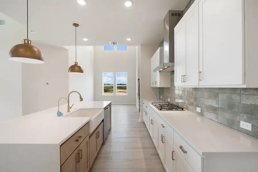 Furnished interior view inside a new home in Arbor Collection At Wolf Ranch, Georgetown (Image 11).