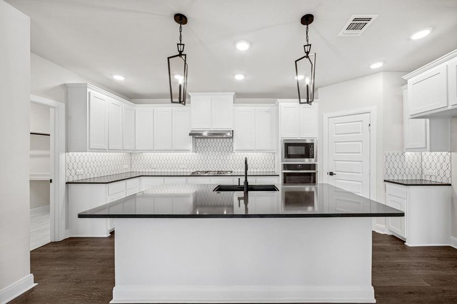 Furnished interior view inside a new home in Karis - Village Series, Crowley (Image 14). Furnished interior view inside a new home in Karis - Village Series, Crowley (Image 14).