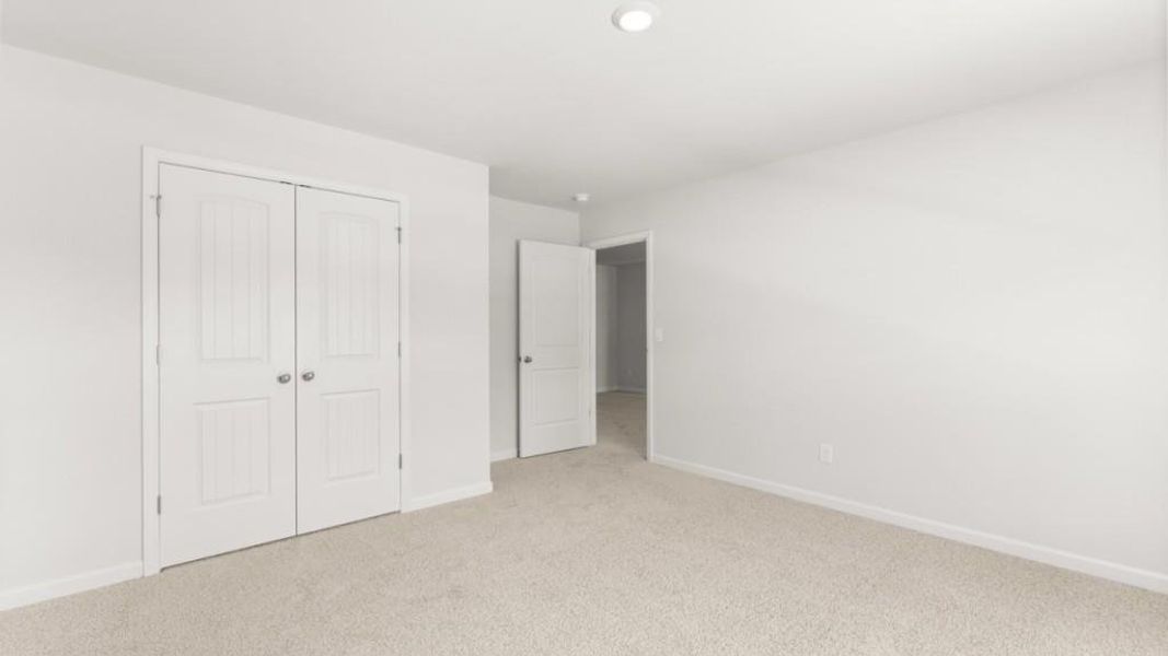 Spacious, unfurnished interior of a new home in Northwoods at Mirror Lake, Villa Rica (Image 22).