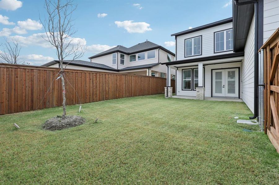 Exterior details and patio area of a home in , Rowlett (Image 25).