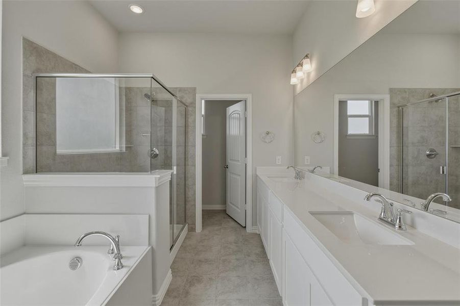 Contemporary bathroom featuring a spacious walk-in shower with glass enclosure, a built-in soaking tub, and a double vanity with undermount sinks Contemporary bathroom featuring a spacious walk-in shower with glass enclosure, a built-in soaking tub, and a double vanity with undermount sinks