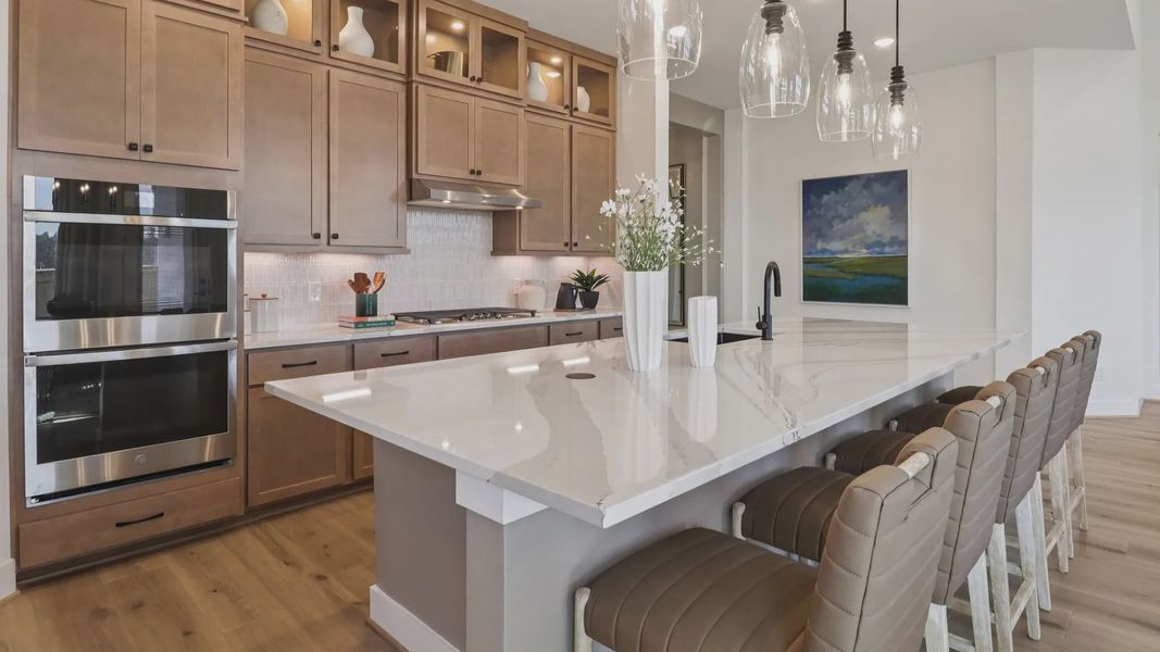 Representative furnished interior of a home built from the Marbella by Chesmar Homes in Audubon, Magnolia (Image 11).