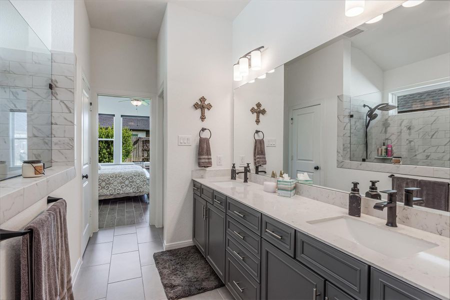 Another view of bathroom leaving the closet area.