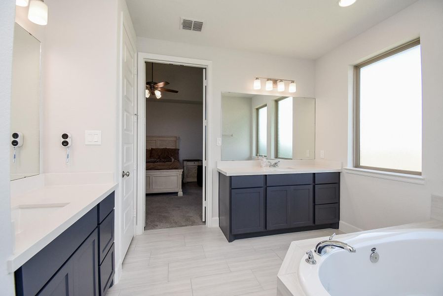 Furnished interior view inside a new home in Marvida, Cypress (Image 30).