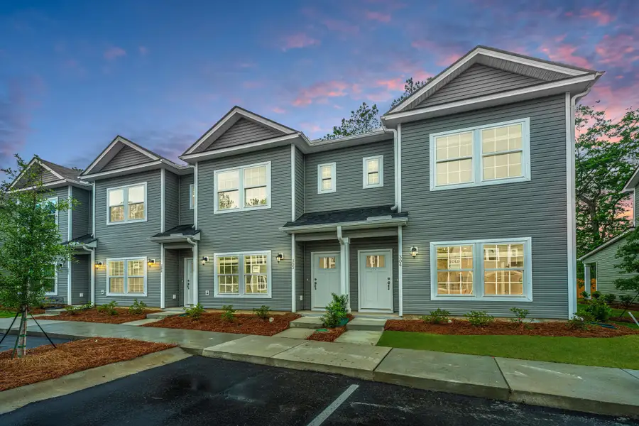 Front exterior of a new home in , Wando, SC, highlighting curb appeal (Image 30).