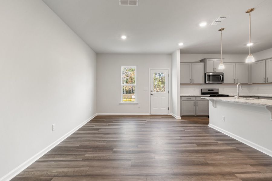 Spacious, unfurnished interior of a new home in Poets Walk, Whitsett (Image 14).