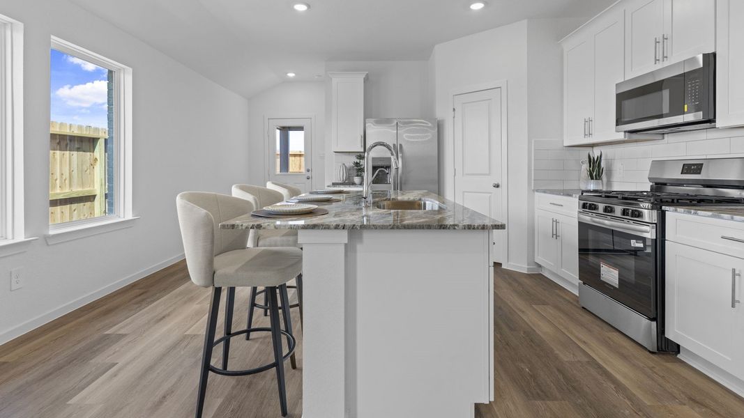 Furnished interior view inside a new home in Tamarron, Fulshear (Image 15).