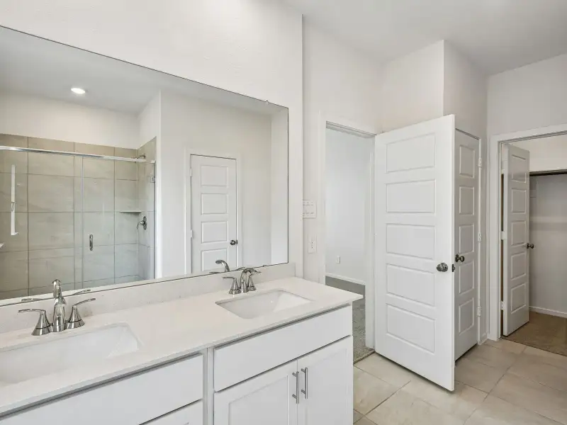Furnished interior view inside a new home in Riviera Pines - Premier Series, Huffman (Image 8).