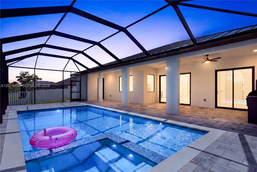 SCREENED LANAI w/ PERFECT SETTING TO RELAX in SPA, SWIM in HEATED POOL, or HOST UNFORGETTABLE BBQs! SCREENED LANAI w/ PERFECT SETTING TO RELAX in SPA, SWIM in HEATED POOL, or HOST UNFORGETTABLE BBQs!