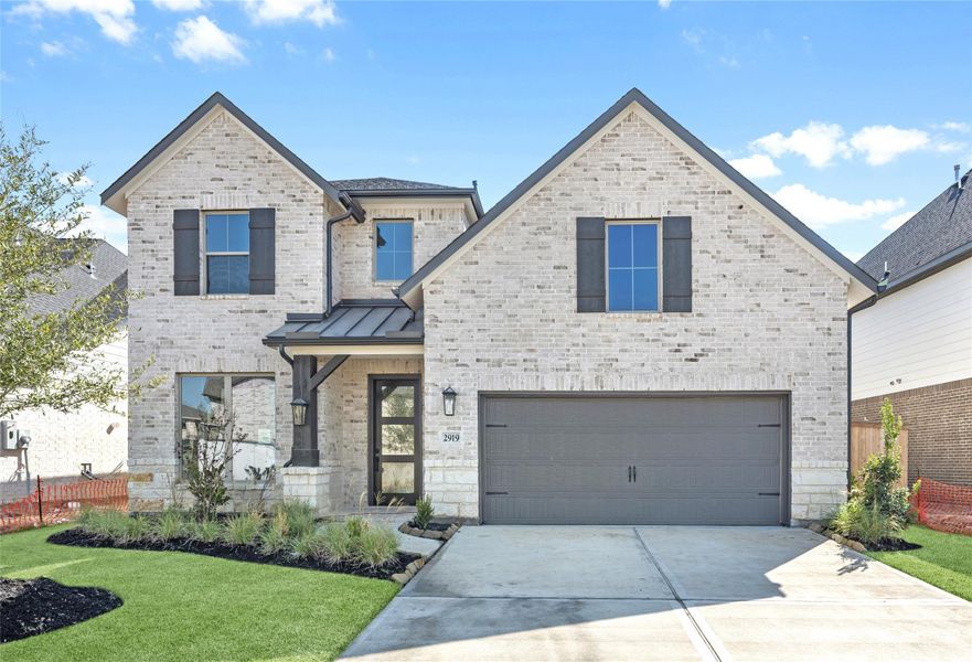 Front exterior of a new home in Jordan Ranch – 50', Katy, TX, highlighting curb appeal (Image 1). Front exterior of a new home in Jordan Ranch – 50', Katy, TX, highlighting curb appeal (Image 1).