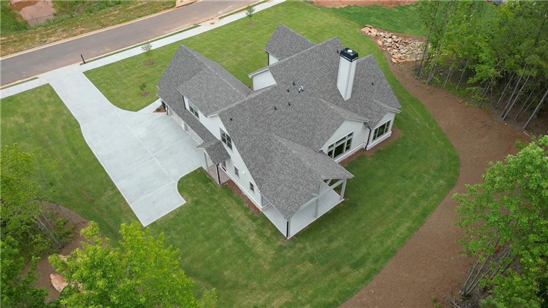 Front exterior of a new home in , Newnan, GA, highlighting curb appeal (Image 35). Front exterior of a new home in , Newnan, GA, highlighting curb appeal (Image 35).