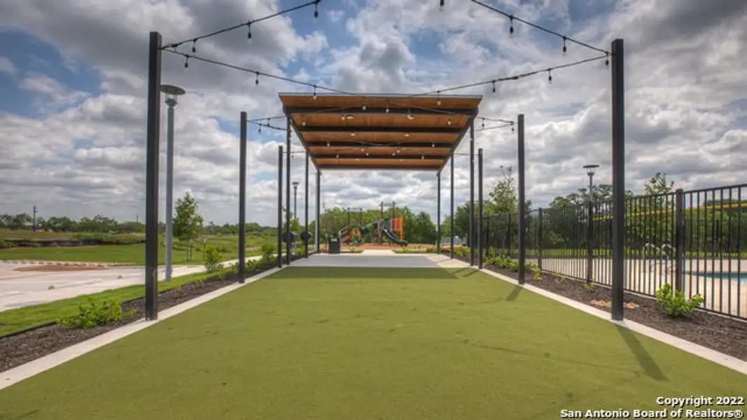 Front exterior of a new home in Arroyo Ranch, Seguin, TX, highlighting curb appeal (Image 9). Front exterior of a new home in Arroyo Ranch, Seguin, TX, highlighting curb appeal (Image 9).
