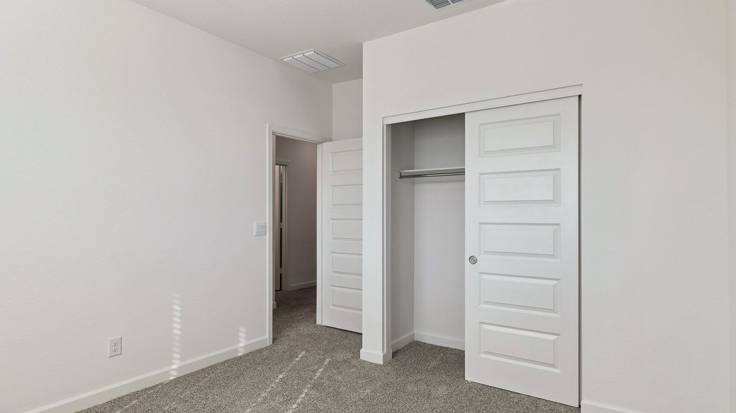 Spacious, unfurnished interior of a new home in Apache Farms, Buckeye (Image 34).