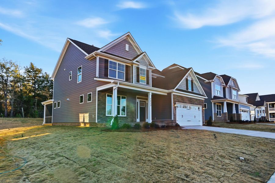 Front exterior of a new home in Waterford Commons, Rock Hill, SC, highlighting curb appeal (Image 22). Front exterior of a new home in Waterford Commons, Rock Hill, SC, highlighting curb appeal (Image 22).