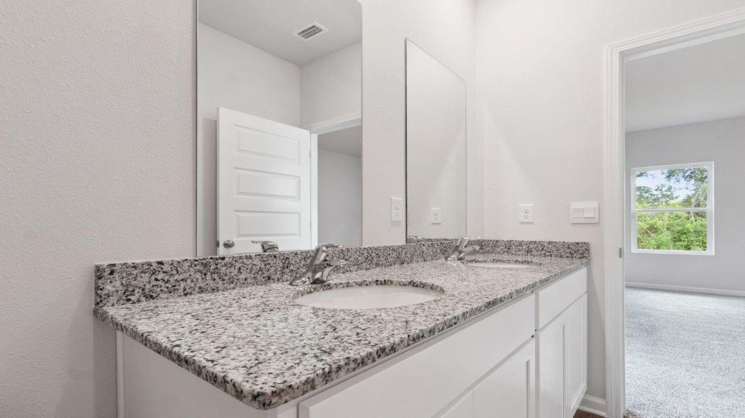 Representative furnished interior of a home built from the The Walker by D.R. Horton in Olson Ridge, Tallahassee (Image 15).