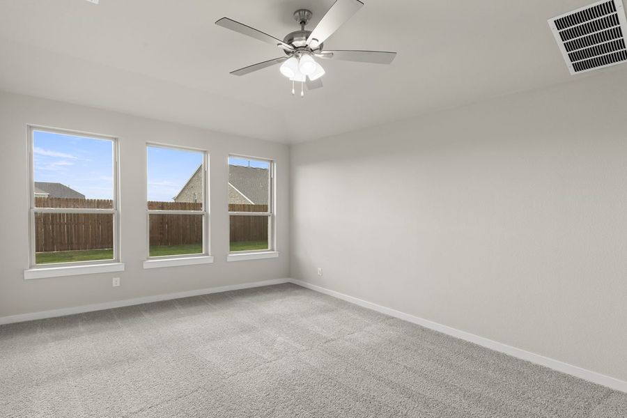 Representative unfurnished interior of a home built from the Hickory Sunterra 50s by Brohn Homes in Sunterra, Katy (Image 15).
