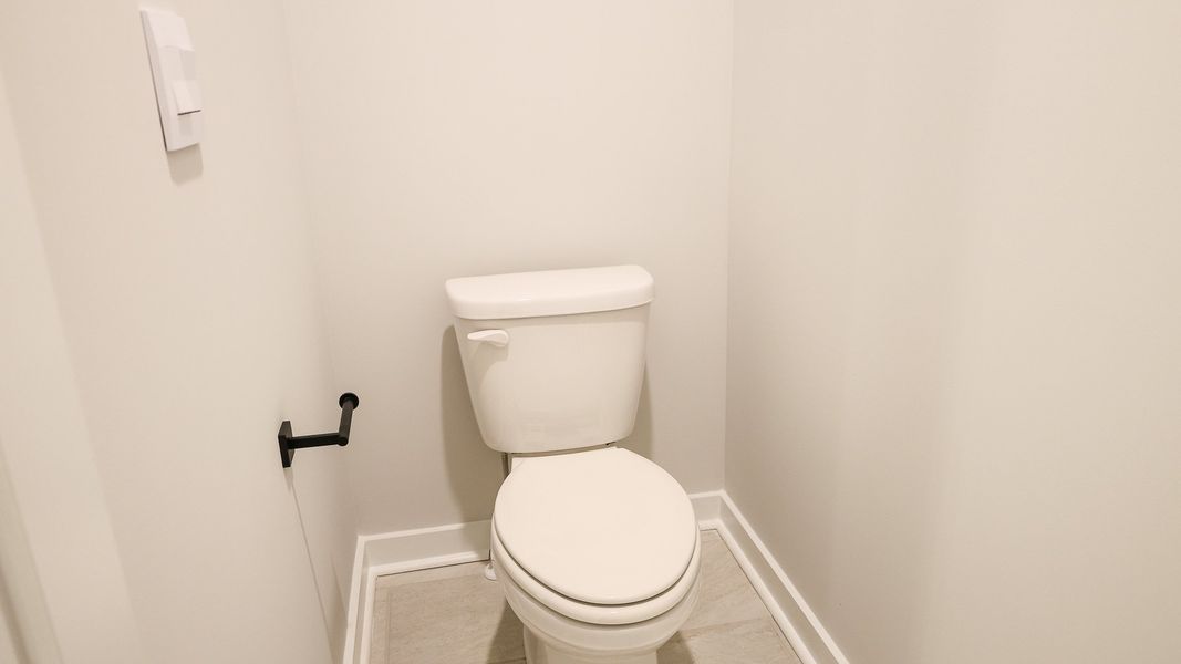 Representative furnished interior of a home built from the STONEBROOK II by D.R. Horton in Harvest Point, Spring Hill (Image 16).