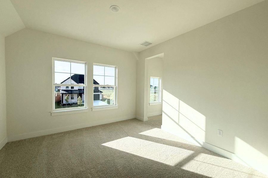 A well-lit, neutral-toned room provides a versatile canvas for any design aesthetic. A well-lit, neutral-toned room provides a versatile canvas for any design aesthetic.