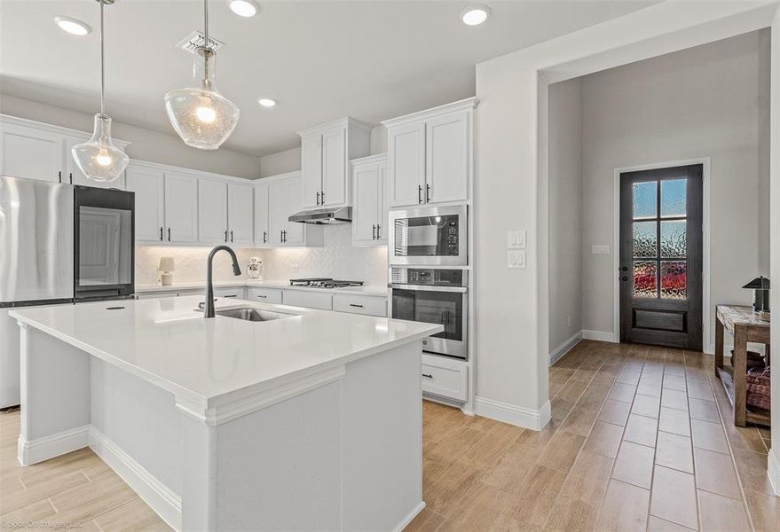 Quartz island with pop up outlet