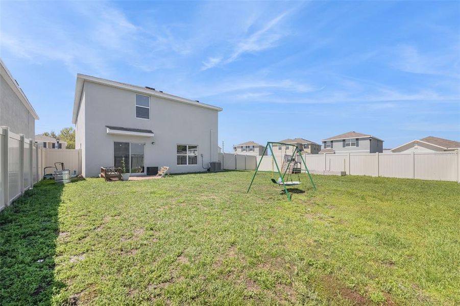 Exterior details and patio area of a home in Harvest Ridge, Zephyrhills (Image 29).