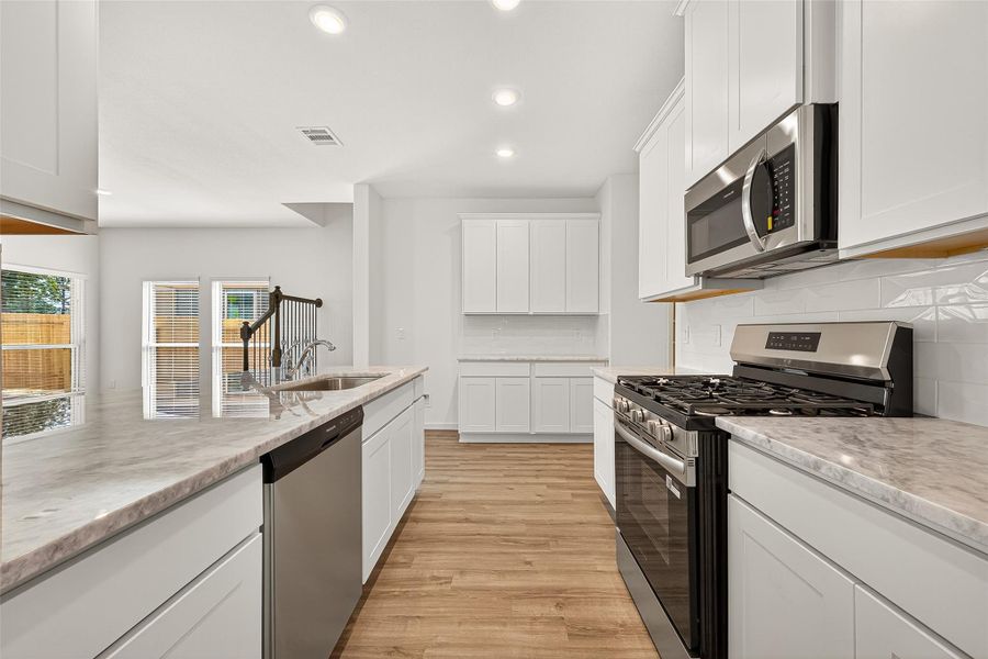 Furnished interior view inside a new home in Mill Creek Trails, Magnolia (Image 11).