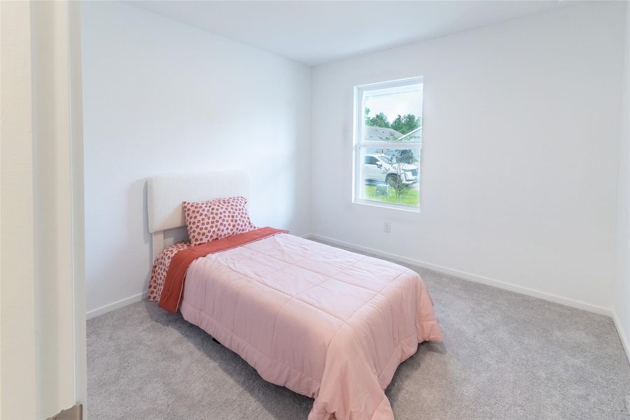 One of two roomy secondary bedrooms that can be used for a bedroom, office, playroom or home gym. One of two roomy secondary bedrooms that can be used for a bedroom, office, playroom or home gym.