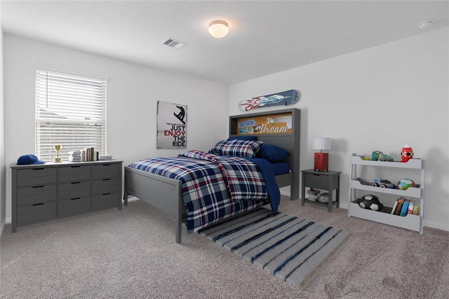 Secondary bedroom features plush carpet, neutral paint, lighting, large window with privacy blinds and ample sized closet space.