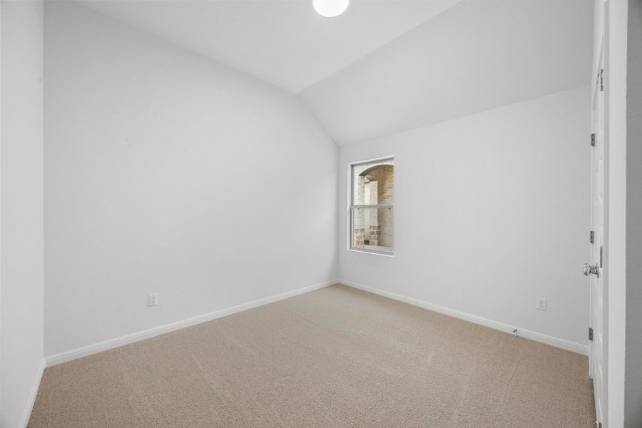 Bedroom in the Cypress home plan by Trophy Signature Homes - REPRESENTATIVE PHOTO Bedroom in the Cypress home plan by Trophy Signature Homes - REPRESENTATIVE PHOTO