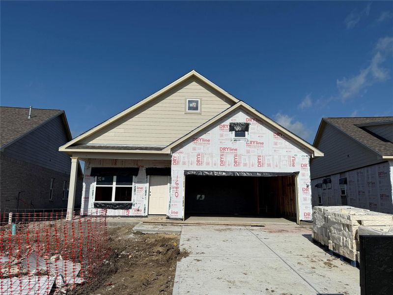 Front exterior of a new home in River Ranch, Dayton, TX, highlighting curb appeal (Image 2). Front exterior of a new home in River Ranch, Dayton, TX, highlighting curb appeal (Image 2).