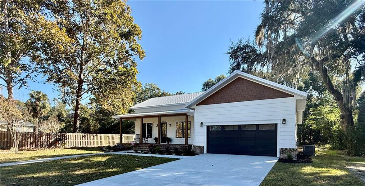 Front exterior of a new home in , High Springs, FL, highlighting curb appeal (Image 2).