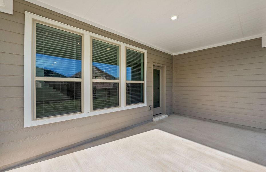 Exterior details and patio area of a home in Santa Rita Ranch, Liberty Hill (Image 26).