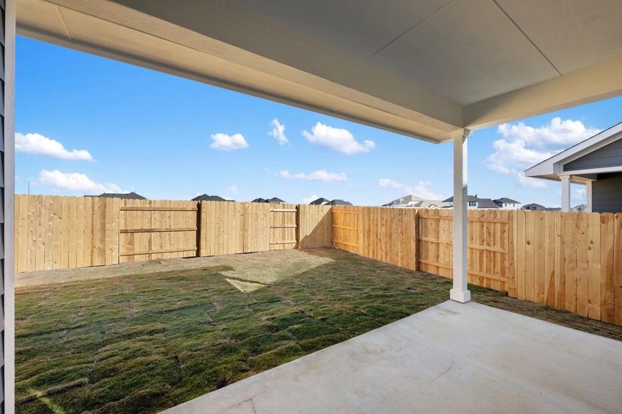Exterior details and patio area of a home in Lariat, Liberty Hill (Image 28). Exterior details and patio area of a home in Lariat, Liberty Hill (Image 28).