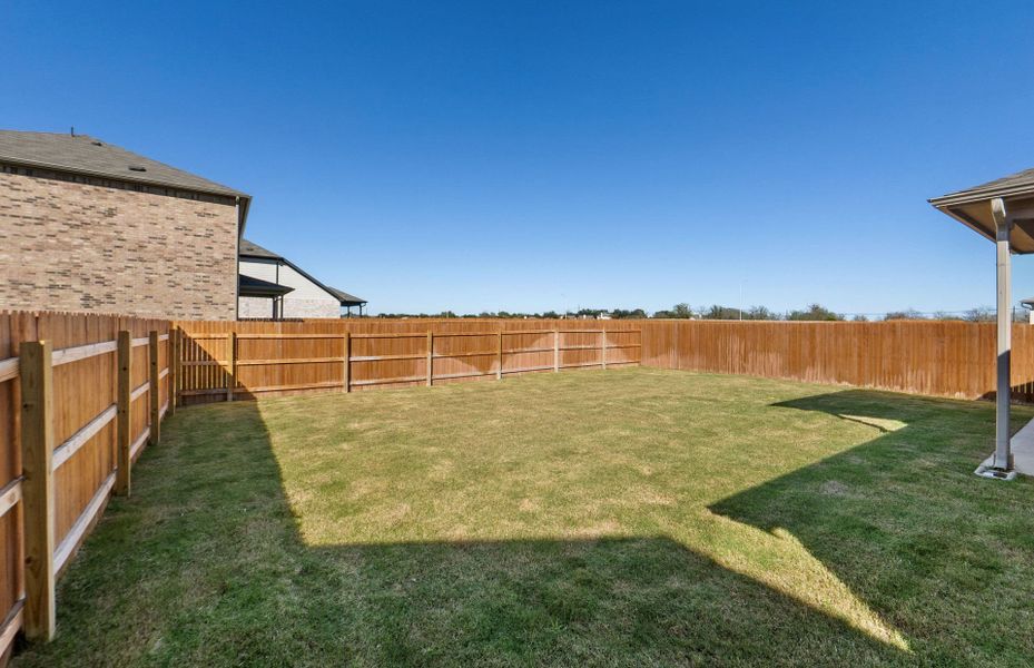 Exterior details and patio area of a home in Lagos, Manor (Image 24).