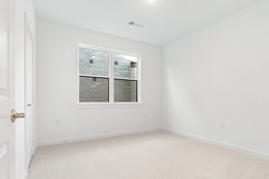 Spacious, unfurnished interior of a new home in Willow Grove Townhomes, Melissa (Image 23).